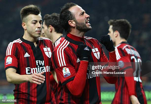 Giampaolo Pazzini of AC Milan celebrates after scoring the opening goal during the TIM Cup match between AC Milan and US Sassuolo Calcio at Stadio...