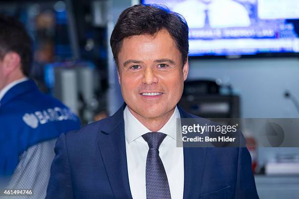 Actor Donny Osmond rings the Closing Bell at New York Stock Exchange on January 13, 2015 in New York City.