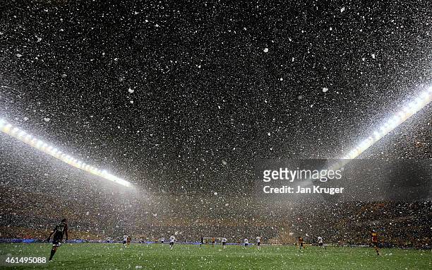 Snow falls during the FA Cup third round replay match between Wolverhampton Wanderers and Fulham at Molineux on January 13, 2015 in Wolverhampton,...