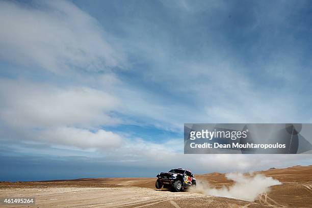 Nasser Al Attiyah of Qatar and Mathieu Baumel of France for the ALL4 Racing Mini Qatar Rally Team compete in the Atacama Desert during day 10 of the...