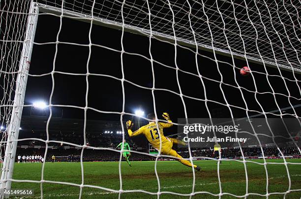 Joel Robles of Everton hits the crossbar with his penalty in the shoot out as Adrian of West Ham United looks during the FA Cup Third Round Replay...