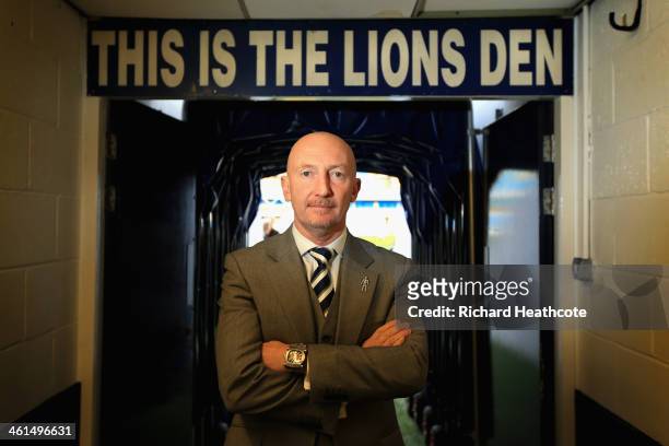 Ian Holloway poses for a picture during a press conference to announce him as the new Millwall manager at The Den on January 9, 2014 in London,...
