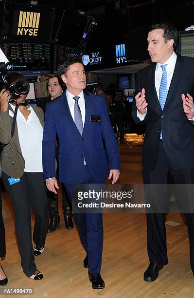 Singer/actor Donny Osmond with John Tuttle rings The NYSE Closing Bell at New York Stock Exchange on January 13, 2015 in New York City.
