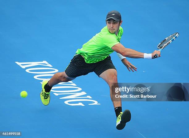Jordan Thompson of Australia plays a backhand during his match against Kei Nishikori of Japan during day two of the Priceline Pharmacy Classic at...