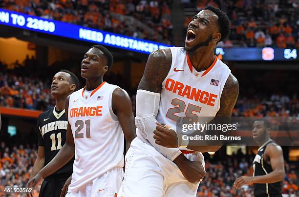 Rakeem Christmas of the Syracuse Orange reacts to a made basket and a foul against the Wake Forest Demon Deacons during the second half at the...