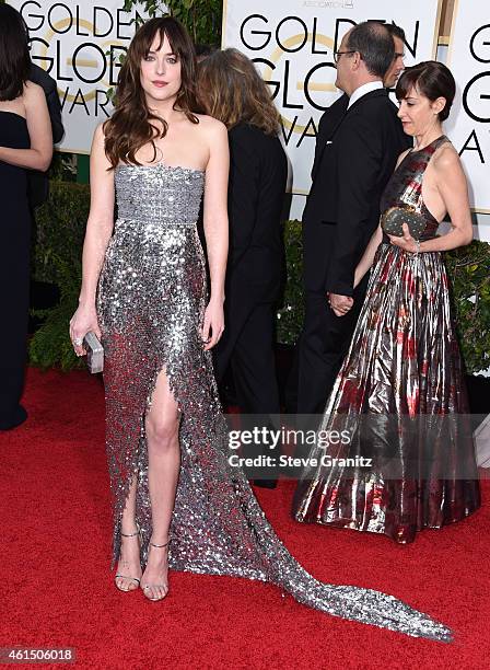 Dakota Johnson arrives at the 72nd Annual Golden Globe Awards at The Beverly Hilton Hotel on January 11, 2015 in Beverly Hills, California.