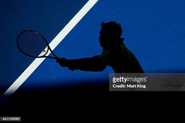 Fabio Fognini of Italy plays a backhand in his match against Juan Martin Del Potro of Argentina during day four of the 2015 Sydney International at...