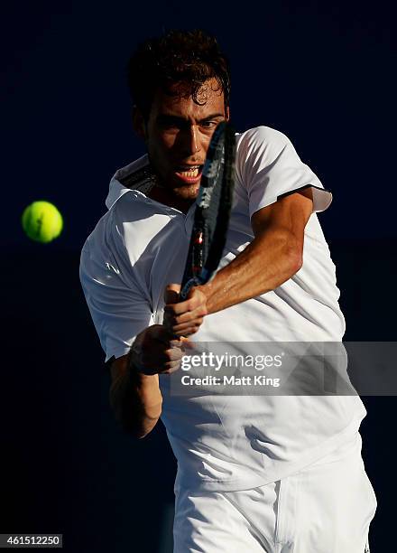 Jerzy Janowicz of Poland plays a backhand in his match against Leonardo Mayer of Argentina during day four of the 2015 Sydney International at Sydney...