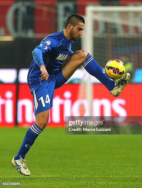 Leonardo Pavoletti of US Sassuolo Calcio controls the ball during the TIM Cup match between AC Milan and US Sassuolo Calcio at Stadio Giuseppe Meazza...