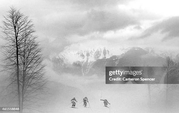 Anna Holmlund of Sweden, Stephanie Joffroy of Chile and Katrin Ofner of Austria compete in heavy fog in the Freestyle Skiing Womens' Ski Cross...