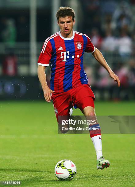 Thomas Mueller of Muenchen controles the ball during a friendly match between FC Bayern Muenchen and Qatar Stars at Abdullah bin Khalifa Stadium on...
