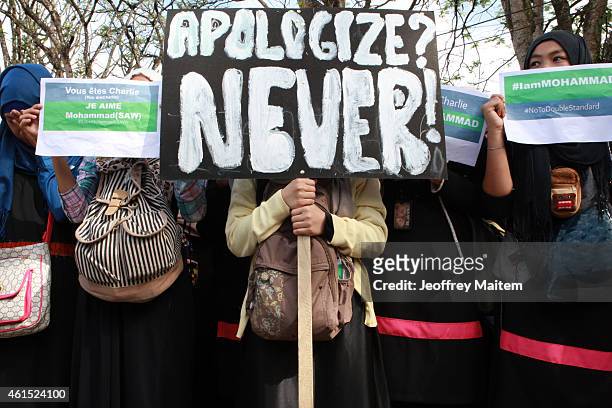 Filipino Muslims attend a protest rally on January 14, 2014 in Marawi, Philippines. They were protesting at what they described as "Double Standard"...