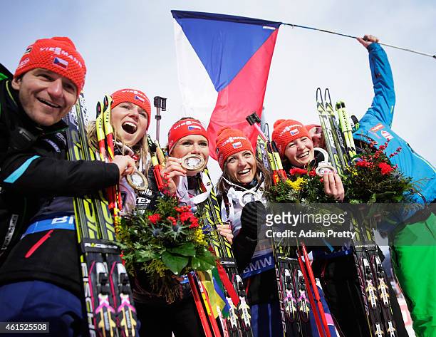 Eva Puskarcikova, Gabriela Soukalova, Jitka Landova and Veronika Vitkova of the Czech Rebublic celebrate victory in the IBU Biathlon World Cup...