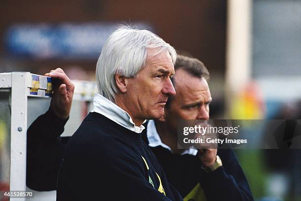 Norwich City manager Mike Walker and assistant John Deehan look on during an FA Premier League match between Wimbledon and Norwich City at Selhurst...