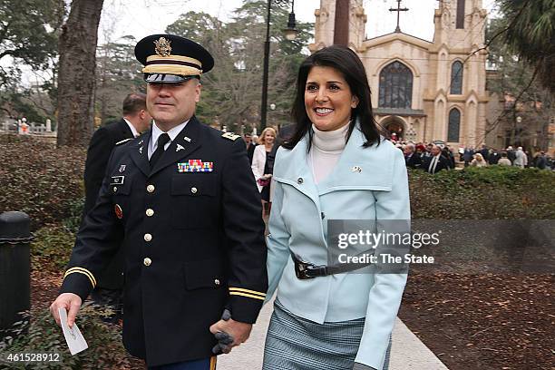 Governor Nikki Haley, joined by her husband Michael, head to the State House to be sworn in after the Inaugural Prayer service held at Trinity...