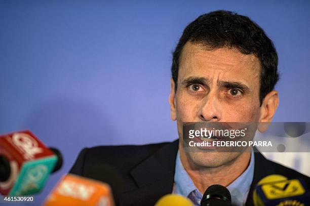 Miranda state governor and opposition leader Henrique Capriles Radonski speaks during a press conference in Caracas on January 14, 2015. The...