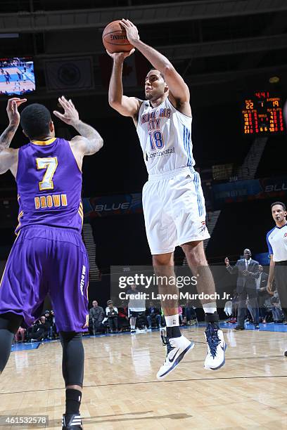 Grant Jerrett of the Oklahoma City Blue shoots the ball against the Los Angeles D-Fenders during an NBDL game on January 13 2014 at the Cox...