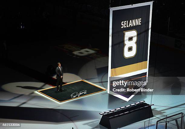 Former Anaheim Ducks player Teemu Selanne looks up during his jersey retirement ceremony as part of Teemu Tribute Night before the game between the...