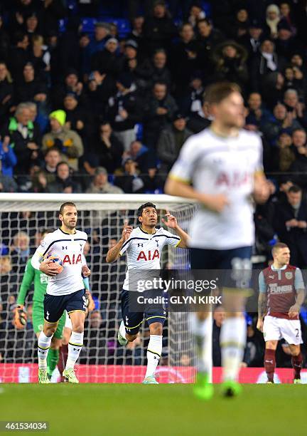 Tottenham Hotspur's Brazilian midfielder Paulinho celebrates scoring his team's first goal during the English FA Cup Third Round football match...