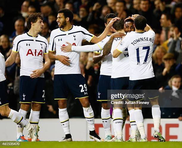 Danny Rose of Spurs celebrates with team mates as he scores their fourth goal during the FA Cup Third Round Replay match between Tottenham Hotspur...