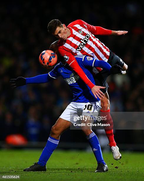 Florin Gardos of Southampton jumps for the ball with David McGoldrick of Ipswich during the FA Cup third round replay match between Ipswich Town and...