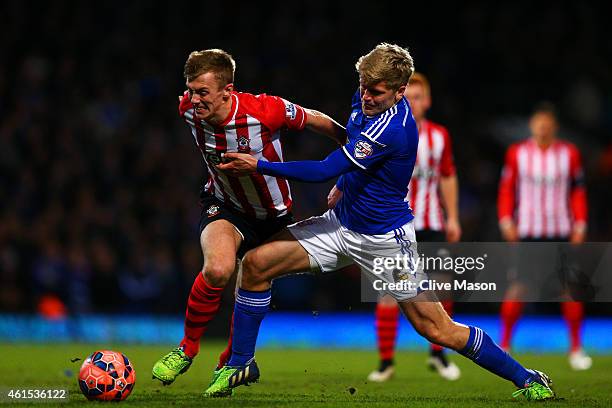 Jonathan Parr of Ipswich battles for the ball with James Ward-Prowse of Southampton during the FA Cup third round replay match between Ipswich Town...