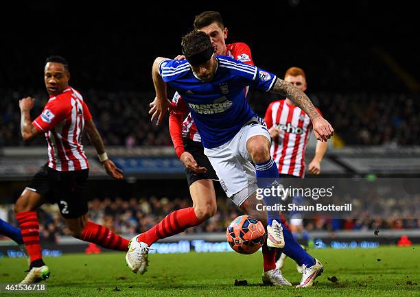 Daryl Murphy of Ipswich controls the ball during the FA Cup third round replay match between Ipswich Town and Southampton at Portman Road on January...