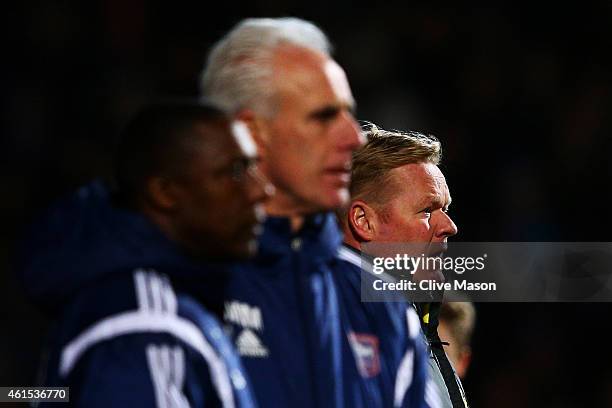 Ronald Koeman, manager of Southampton watches the action on the touchline next to Mick McCarthy, manager of Ipswich during the FA Cup third round...