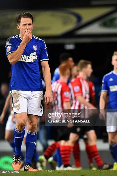 Ipswich Town's Scottish defender Christophe Berra leaves the pitch at the end of the English FA Cup Third Round football match replay between Ipswich...