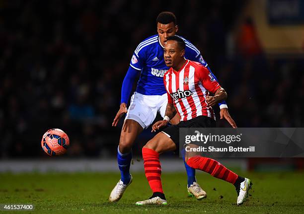 Tyrone Mings of Ipswich battles for the ball with Nathaniel Clyne of Southampton during the FA Cup third round replay match between Ipswich Town and...