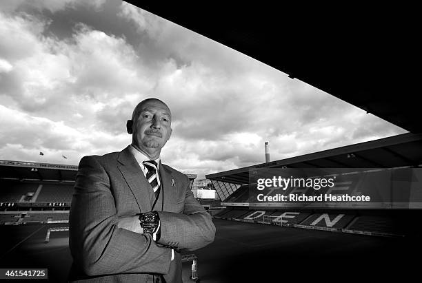 Ian Holloway poses for a picture during a press conference to announce him as the new Millwall manager at The Den on January 9, 2014 in London,...