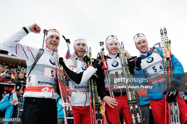 Christoph Sumann, Daniel Mesotitsch, Simon Eder and Dominik Landertinger of Austria overtakes Simon Schempp of Germany to win the men's 4x7.5km relay...