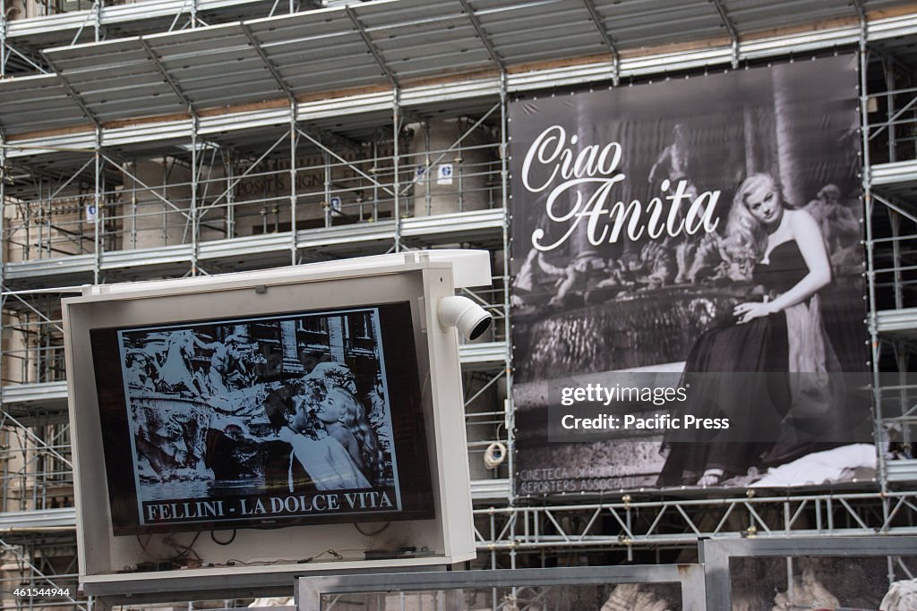 The photo of Anita Ekberg on the Trevi Fountain. Funeral of...