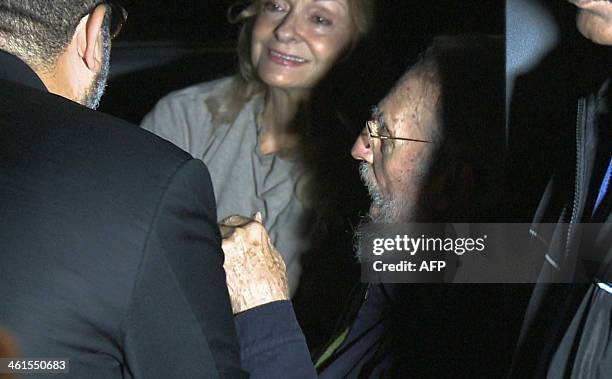 Still grab from a video taken on January 8, 2014 of former Cuban president Fidel Castro and his wife Dalia Soto during the inauguration of the...