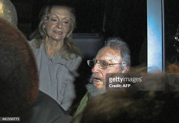 Still grab from a video taken on January 8, 2014 of former Cuban president Fidel Castro and his wife Dalia Soto during the inauguration of the...