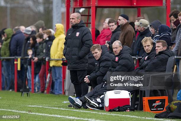 Ass.coach Alfred Schreuder of FC Twente, coach Michel Jansen of FC Twente, ass.trainer Boudewijn Pahlplatz during the friendly match between FC...