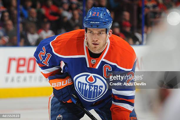 Andrew Ference of the Edmonton Oilers prepares for a face off in a game against the Calgary Flames on December 7, 2013 at Rexall Place in Edmonton,...
