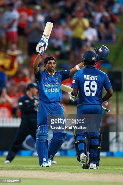 Tillakaratne Dilshan of Sri Lanka celebrates his century during the One Day International match between New Zealand and Sri Lanka at Seddon Park on...