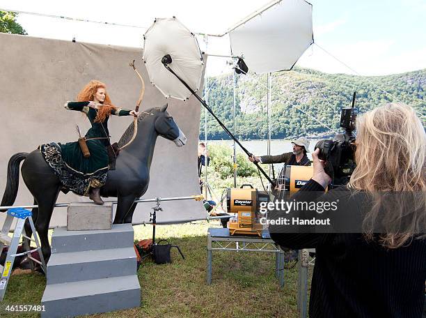 In this handout photo provided by Disney Parks, taken September 25, 2013 in Cold Spring, NY, Jessica Chastain poses for acclaimed photographer Annie...