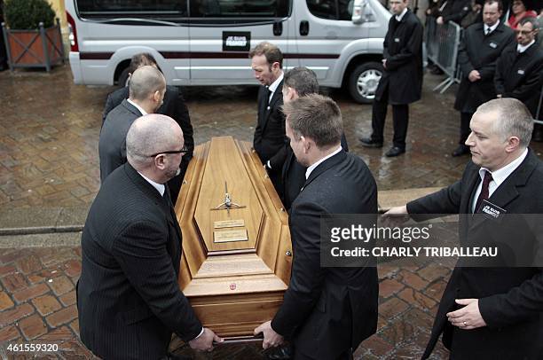 Relatives of Franck Brinsolaro, the police officer charged with protecting late Charlie Hebdo editor Stephane Charbonnier , carry his coffin into the...