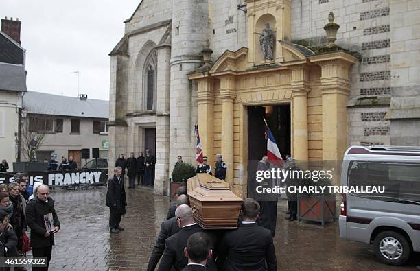 Relatives of Franck Brinsolaro, the police officer charged with protecting late Charlie Hebdo editor Stephane Charbonnier , carry his coffin into the...