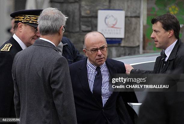 French Interior minister Bernard Cazeneuve arrives to attend the funeral of Franck Brinsolaro, the police officer charged with protecting late...
