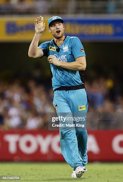 Andrew Flintoff of the Heat celebrates taking a catch to dismiss Jon Wells of the Hurricanes during the Big Bash League match between the Brisbane...