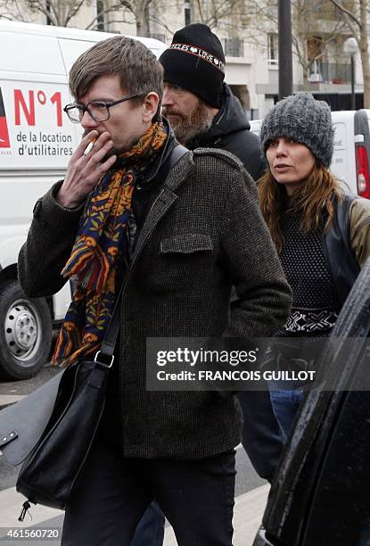 French cartoonist Renald Luzier, aka Luz, and judicial columnist Sigolene Vinson arrive to attend the funeral of Elsa Cayat, a psychoanalyst and...