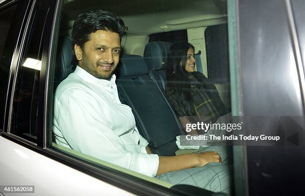 Riteish Deshmukh with wife Genelia D'Souza at Karan Johar's party in Mumbai.