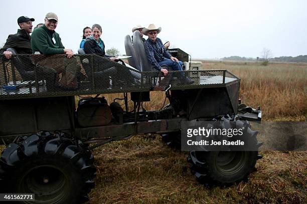 Secretary of the Interior Sally Jewell sits behind Lefty Durando, Owner, Durando Ranch, and in front of David Houghton, President National Wildlife...