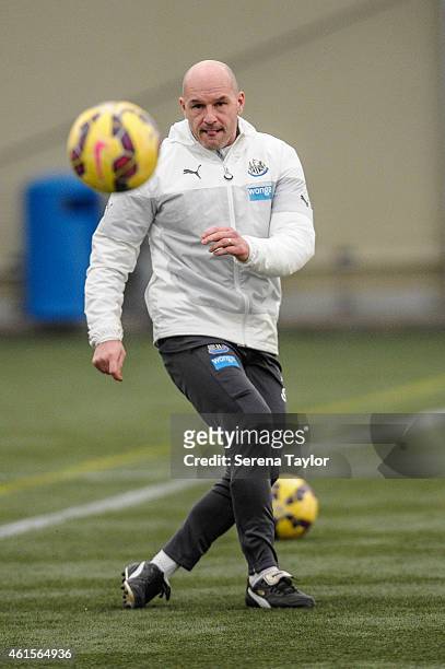 First Team Coach Steve Stone kicks the ball during a Newcastle United Training Session at The Newcastle United Training Centre on January 15 in...