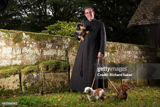 Cleric and broadcaster Richard Coles is photographed for the Observer on October 16, 2014 at St Mary the Virgin church, Finedon, England.