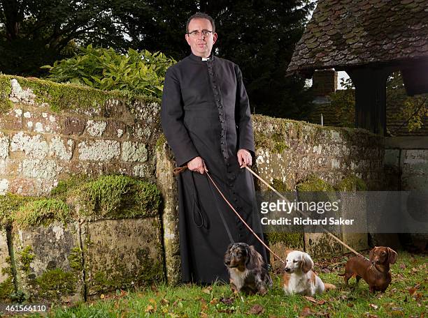 Cleric and broadcaster Richard Coles is photographed for the Observer on October 16, 2014 at St Mary the Virgin church, Finedon, England.