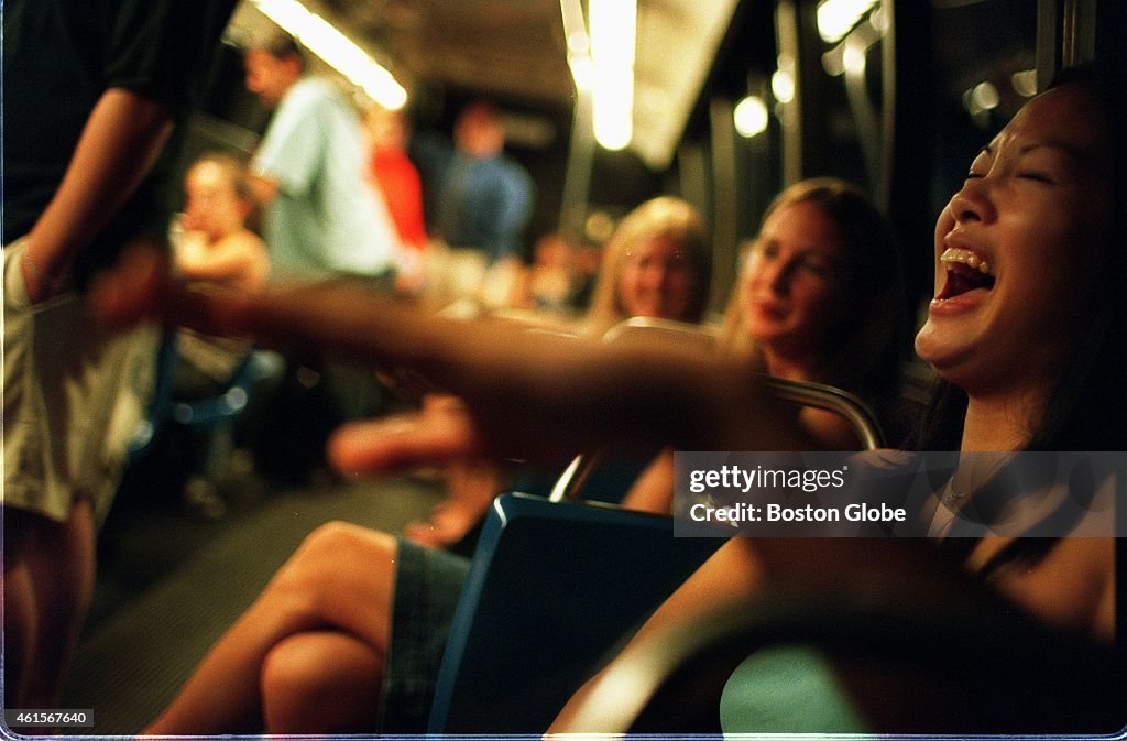 Mbta The Ride People ride the MBTA bus home from Faneuil Hall on the first night of ...